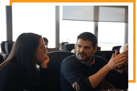 Alter Solutions consultants discussing ways to improve Natixis' infrastructure